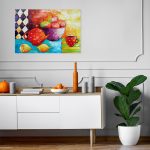 Obraz z kubkiem w kropki i jabłkami